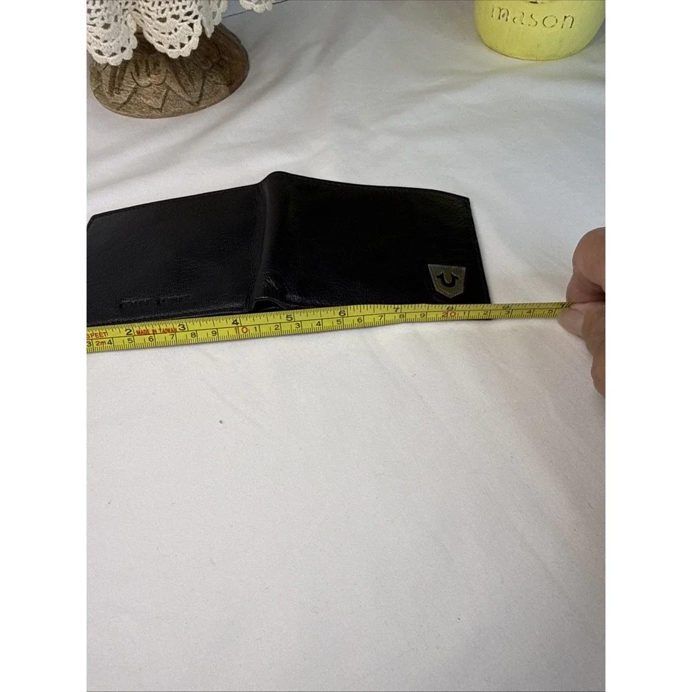 True Religion Men's Genuine Leather Black Bifold Wallet RFID Metal Logo.